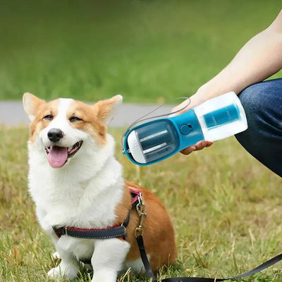 “All-in-One Portable Pet Cup — Water, Food, and Waste Bag Solution”